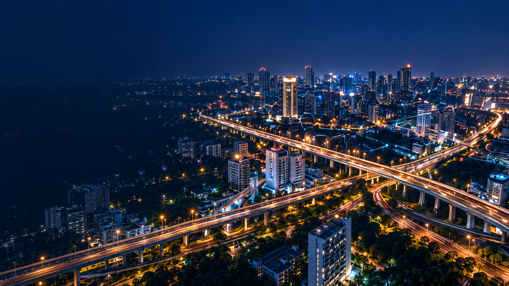 Indian smart city infrastructure and elevated roads illuminated at night